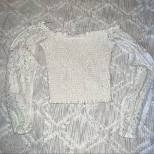 Smocked white top with lace sleeves